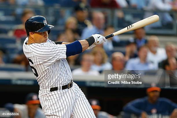 Carlos Beltran of the New York Yankees in action against the Houston Astros at Yankee Stadium on August 19, 2014 in the Bronx borough of New York...