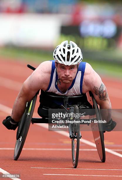 Mickey Bushell of Great Britain wins the Men's 100m T53 event during day two of the IPC Athletics European Championships at Swansea University Sports...