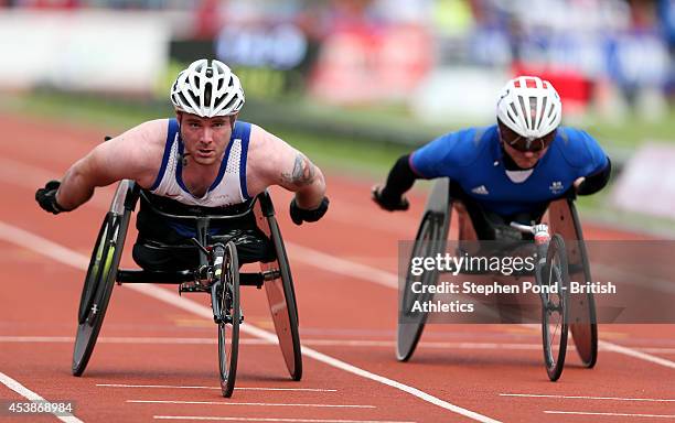 Mickey Bushell of Great Britain wins the Men's 100m T53 event during day two of the IPC Athletics European Championships at Swansea University Sports...