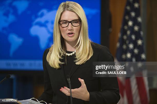 State Department Deputy Spokesperson Marie Harf speaks about the killing of American journalist James Foley by Islamic militants, as she holds the...