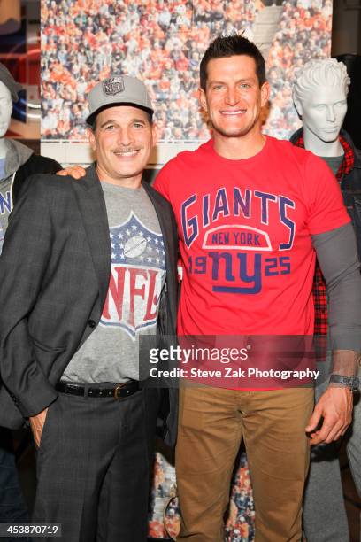 Phillip Bloch and Steve Weatherford attend Junk Food Clothing's 2014 NFL Playoff Tailgate Party at Bloomingdale's on December 5, 2013 in New York...