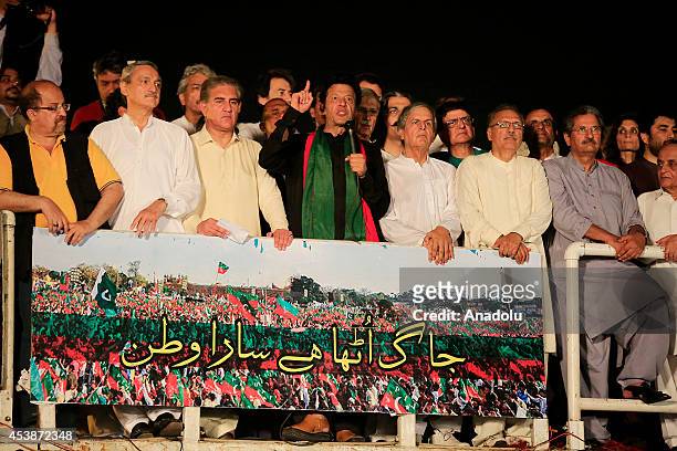 Pakistani cricketer-turned politician and chairman of the Pakistan Tehreek-e-Insaf political party, Imran Khan speaks during an anti-government rally...