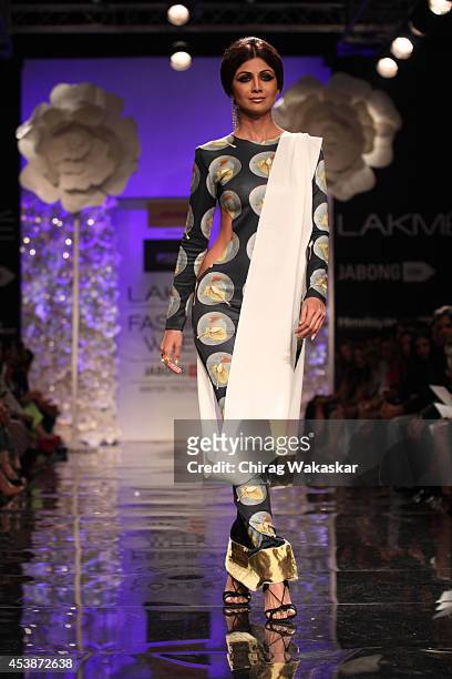 Shilpa Shetty showcases designs by Masaba during the Opening Day show as part of Lakme Fashion Week Winter/Festive 2014 at The Palladium Hotel on...