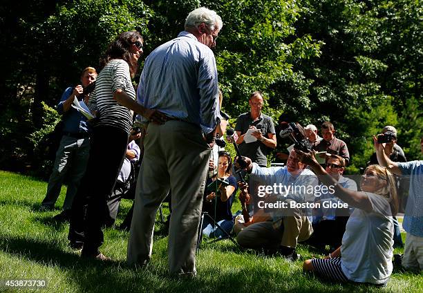 Journalist James Foley's parents John and Diane Foley speak to reporters about James' murder outside of their home in Rochester, New Hampshire August...