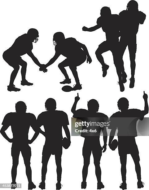 football players in action - american football player silhouette stock illustrations