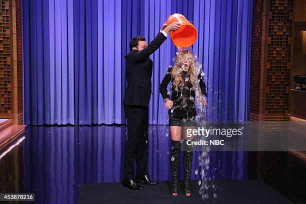 Episode 0112 -- Pictured: Host Jimmy Fallon challenges actress Lindsay Lohan to the "Ice Bucket Challenge" on August 20, 2014 --