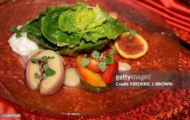 The First Course on the menu for the 66th Emmy Awards Governors Ball is displayed during a Press Preview on August 20, 2014 in Los Angeles,...