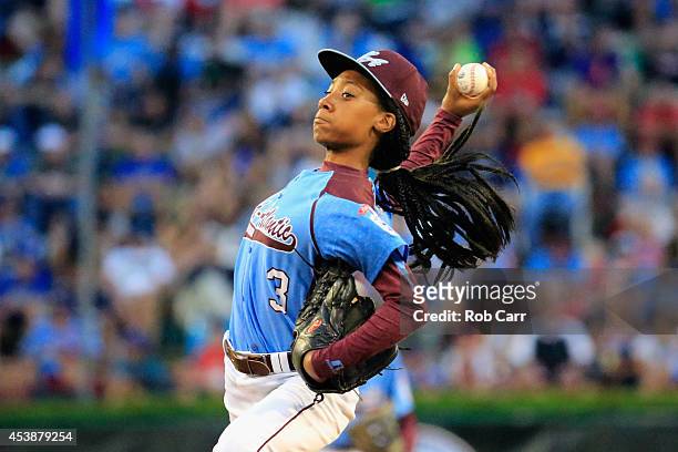 Mo'ne Davis of Pennsylvania pitches to a Nevada batter during the first inning of the United States division game at the Little League World Series...
