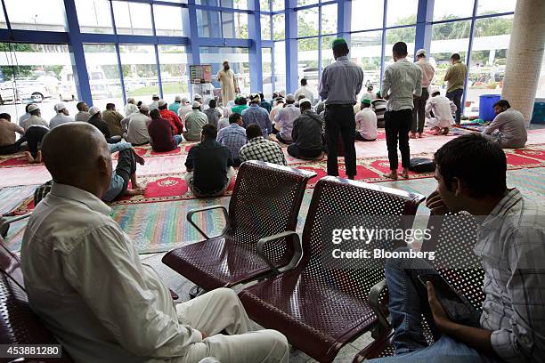Muslim men attend a prayer session in the lobby of the the Indraprastha Apollo Hospitals facility, operated by Apollo Hospitals Enterprise Ltd., in...