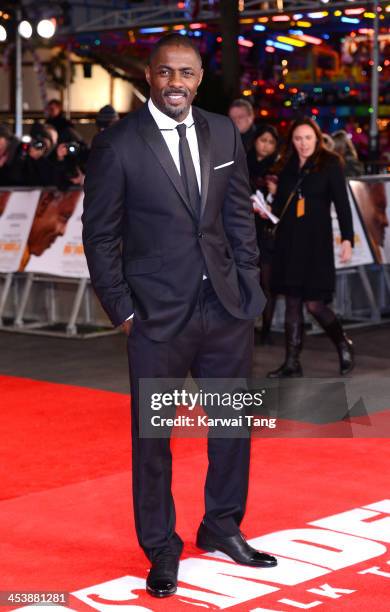 Idris Elba attends the Royal film performance of "Mandela: Long Walk To Freedom" held at the Odeon Leicester Square on December 5, 2013 in London,...