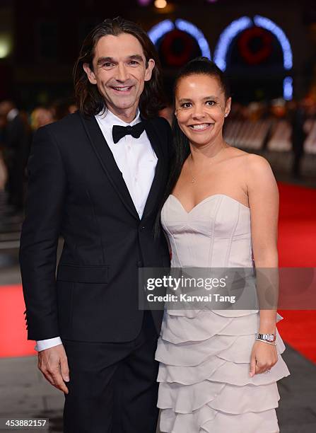 Justin Chadwick and Michelle Chadwick attend the Royal film performance of "Mandela: Long Walk To Freedom" held at the Odeon Leicester Square on...