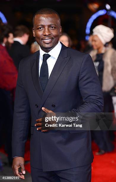 Tony Kgoroge attends the Royal film performance of "Mandela: Long Walk To Freedom" held at the Odeon Leicester Square on December 5, 2013 in London,...