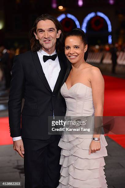 Justin Chadwick and Michelle Chadwick attend the Royal film performance of "Mandela: Long Walk To Freedom" held at the Odeon Leicester Square on...