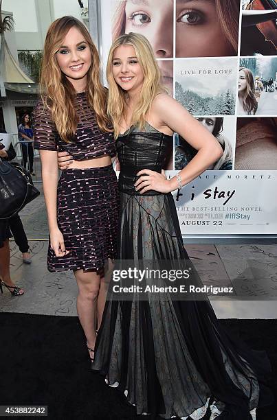 Actresses Liana Liberato and Chloe Grace Moretz attend the premiere of New Line Cinema's and Metro-Goldwyn-Mayer Pictures' "If I Stay" at TCL Chinese...