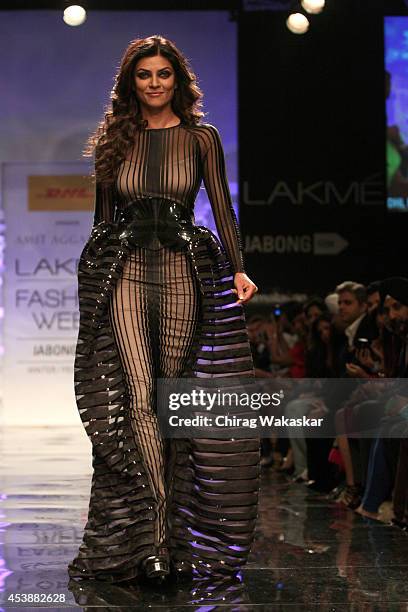 Sushmita Sen showcases designs by Amit Aggarwal during the Opening Day show as part of Lakme Fashion Week Winter/Festive 2014 at The Palladium Hotel...