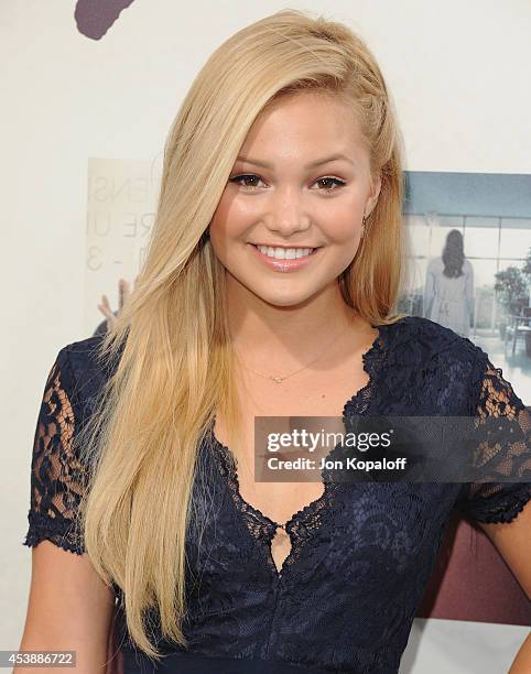 Actress Olivia Holt arrives at the Los Angeles Premiere "If I Stay" at TCL Chinese Theatre on August 20, 2014 in Hollywood, California.