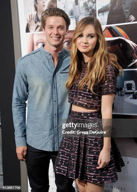 Patrick Schwarzenegger and actress Liana Liberato arrive at the Los Angeles premiere of "If I Stay" at TCL Chinese Theatre on August 20, 2014 in...