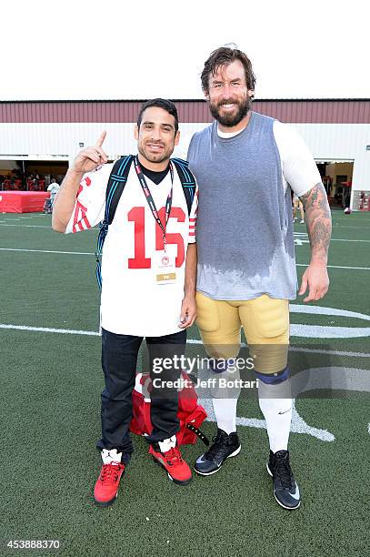 Fighter Danny Castillo poses with San Francisco 49ers offensive tackle Adam Snyder at the SAP Performance Facility at Levi's Stadium on August 20,...