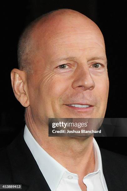 Actor Bruce Willis arrives at the Geffen Playhouse for the opening night of "I'll Eat You Last: A Chat with Sue Mengers" with Bette Midler on...