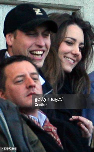 From left, Prince William and girlfriend Kate Middleton watch England's Six Nations Rugby Union match against Italy at Twickenham Stadium, London, 10...