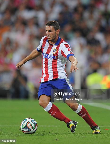 Koke of Club Atletico de Madrid in action during the Supercopa first leg match between Real Madrid and Club Atletico de Madrid at Estadio Santiago...