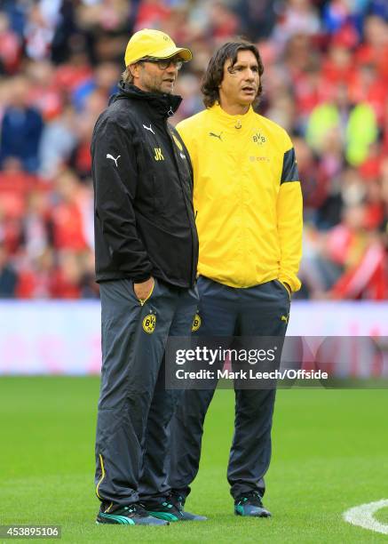 Dortmund coach Jurgen Klopp and assistant Zeljko Buvac look on during the warm-up before the pre-season friendly match between Liverpool and Borussia...