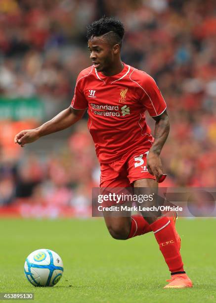 Raheem Sterling of Liverpool in action during the pre-season friendly match between Liverpool and Borussia Dortmund at Anfield on August 10, 2014 in...