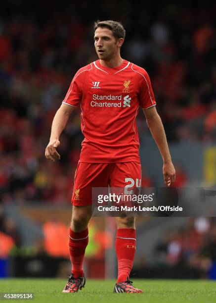 Joe Allen of Liverpool looks on during the pre-season friendly match between Liverpool and Borussia Dortmund at Anfield on August 10, 2014 in...