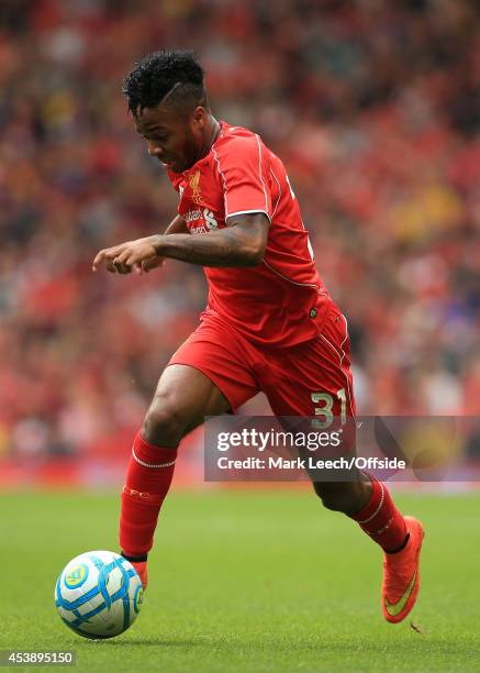 Raheem Sterling of Liverpool in action during the pre-season friendly match between Liverpool and Borussia Dortmund at Anfield on August 10, 2014 in...