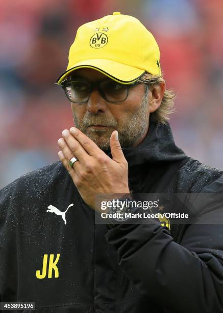 Dortmund coach Jurgen Klopp looks on during the pre-season friendly match between Liverpool and Borussia Dortmund at Anfield on August 10, 2014 in...