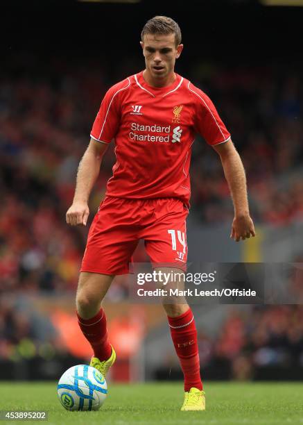 Jordan Henderson of Liverpool in action during the pre-season friendly match between Liverpool and Borussia Dortmund at Anfield on August 10, 2014 in...