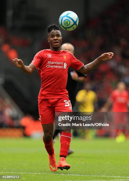 Raheem Sterling of Liverpool in action during the pre-season friendly match between Liverpool and Borussia Dortmund at Anfield on August 10, 2014 in...