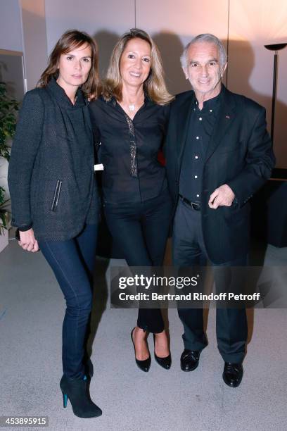 Producer Nicole Coullier standing between Alain Terzian , President of the 'Cesar', the French Academy awards, and his wife Brune de Margerie...