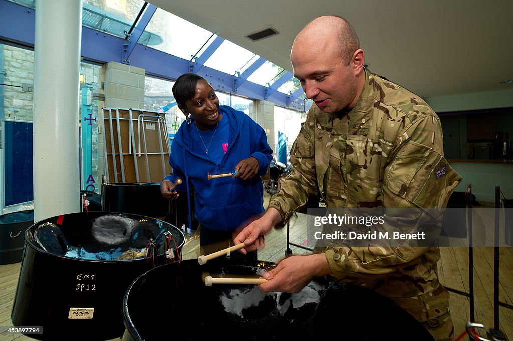 Colin Salmon & Fiona Hawthorne Rehearse With The Corps Of Army Music Ahead Of Their Appearance At The Notting Hill Carnival