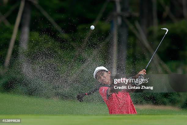 Aditi Ashok of India plays a shot during the Women's Individual Stroke Play on day five of the Nanjing 2014 Summer Youth Olympic Games at Zhongshan...