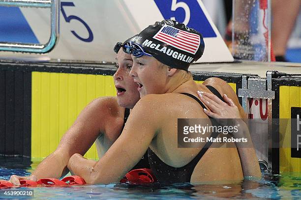 Cammile Adams of the United States celebrates winning the Women's 200m Butterfly final with Katie McLaughlin of the United States during day one of...