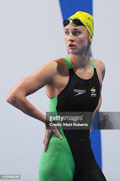 Madeline Groves of Australia looks on after swims in the Women's 200m Butterfly final during day one of the 2014 Pan Pacific Championships at Gold...