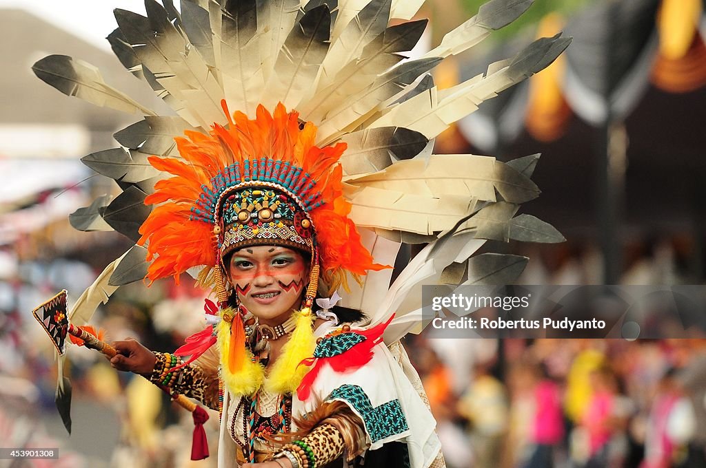 Revellers Gather For The 13th Jember Fashion Carnival 2014