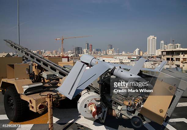Scan Eagle drone sits on the deck of the USS Ponce, on December 6, 2013 in Manama, Bahrain. Secretary Hagel is on a six-day trip to the middle east...