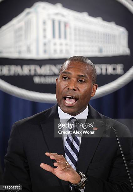 Associate Attorney General Tony West speaks during a major financial fraud announcement August 21, 2014 at the Justice Department in Washington, DC....