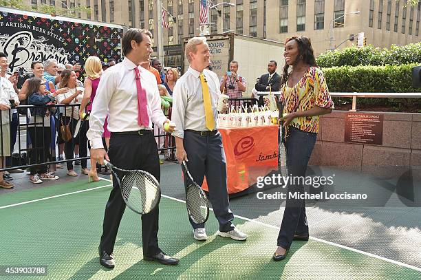 Co-hosts Clayton Morris and Steve Doocy, and professional tennis player Venus Williams appear on "FOX & Friends" at FOX Studios on August 21, 2014 in...