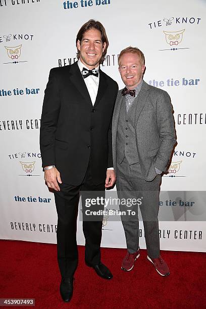 Designer Scott Fujita and actor Jesse Tyler Ferguson attend Tie The Knot Pop-Up Store at The Beverly Center on December 5, 2013 in Los Angeles,...