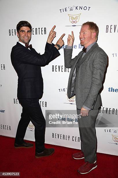 Actor Jesse Tyler Ferguson and husband Justin Mikita attend Tie The Knot Pop-Up Store at The Beverly Center on December 5, 2013 in Los Angeles,...