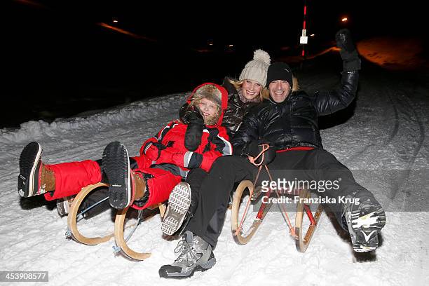 Gioia Filomena Burkhard, Anika Bormann, Gedeon Burkhard attend the Snowshoe Hiking And Slide Tour - Tirol Cross Mountain 2013 on December 05, 2013 in...