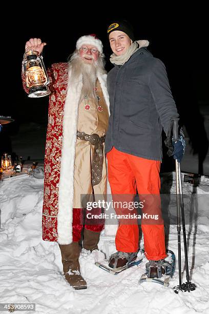 Nikolaus and Luca Bettermann attend the Snowshoe Hiking And Slide Tour - Tirol Cross Mountain 2013 on December 05, 2013 in Innsbruck, Austria.