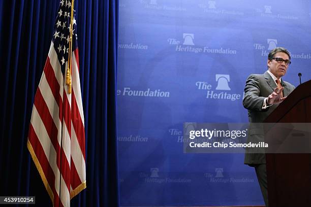 Texas Governor Rick Perry delivers remarks about immigration and the need for more aggressive enforcement along the Texas-Mexico border at the...