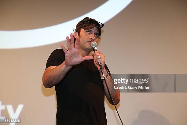 Robert Rodriguez speaks during a Q&A after a screening of "Frank Miller's Sin City 2 A Dame To Kill For" at the Paramount Theatre on August 20, 2014...