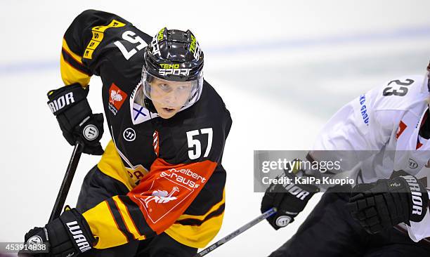 Joonas Lyytinen attacks during the Champions Hockey League game between KalPa Kuopio and Sparta Prague at Data Group Areena on August 21, 2014 in...