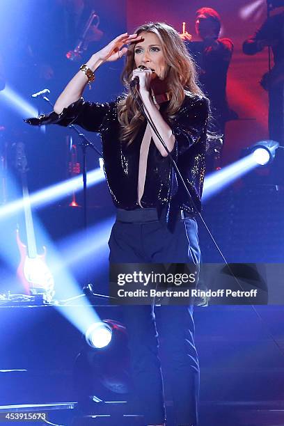 Singer Celine Dion performs at the Palais Omnisports de Bercy on December 5, 2013 in Paris, France.