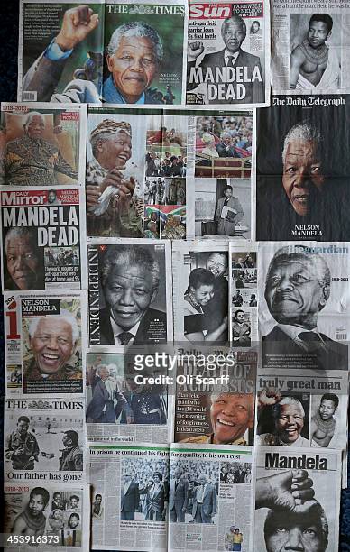 British newspapers report on the death of former South African President Nelson Mandela on December 6, 2013 in London, England. Mr Mandela was a...